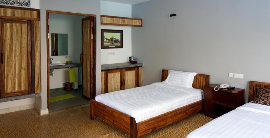 The Sangkum Hotel Πνομ Πενχ Δωμάτιο φωτογραφία