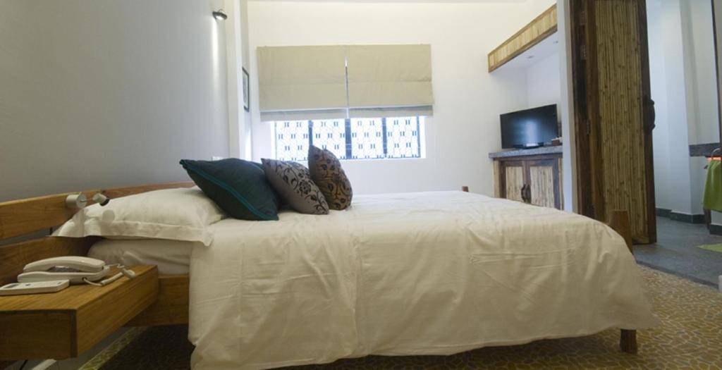 The Sangkum Hotel Πνομ Πενχ Δωμάτιο φωτογραφία